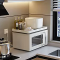 Modern Kitchen Countertop With White Microwave Rice Cooker Olive Oil Bottles And Tea Cups