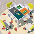 Kids Play Table With Yellow Chairs And Building Block Sections On Watermelon Pattern Mat