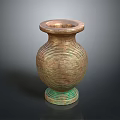 Carved Vase Sculpture With Spiral Texture And Green Base Design