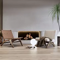 Cozy Accent Chairs By Fireplace With Wooden Floor Round Lamp And Tall Plant