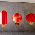 Red Lanterns with Square and Round Shapes Hanging on Gray Wall with Gold Accents