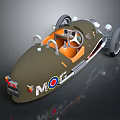 Vintage Olive Green MG Sports Car With Orange Interior And Round Badge