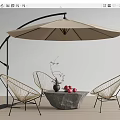 Woven Metal Frame Outdoor Chairs With Stone Table And Beige Patio Umbrella