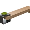 Wooden Long Bench with Black Metal Frame and Green Plant Pot