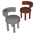 Modern dining chairs in gray and orange with round seats curved armrests and cylindrical legs