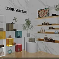Louis Vuitton Interior Featuring White Marble Walls Colorful Glass Cabinets Golden Shelves Bags Green Plants