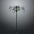 Ornate Green Street Lamp Post With Multiple Glass Lanterns And Decorative Scrolls
