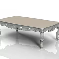 Ornate White Coffee Table With Intricate Carved Legs And Smooth Top