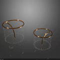 Shiny Golden Circular Garden Ornaments With Curved Stands And Decorative Bead Accents
