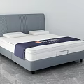 Double Bed With Grey Upholstered Headboard And Comfortable Mattress In Modern Design