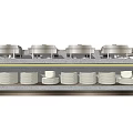 Organized Kitchen Storage With Neatly Stacked Plates Bowls And Dishes