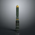 Green Military Guided Missile With Golden Tip And Cylindrical Body On Gray Display Background