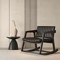 Comfortable Black Rocking Chair with Leather Seat Wooden Frame and Side Table by Light Wall