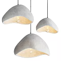 Three Gray Mushroom Shaped Pendant Lights with Soft Light Illuminating from Inside and Soft Material