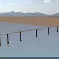 Modern Long Bridge Spanning Blue Water Over Brown Desert With Distant Mountain Range Scenery