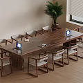Spacious Office Meeting Room With Long Wooden Table Chairs Laptops And Potted Plant
