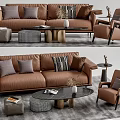 Modern Brown Leather Sofa and Coffee Table Set with Accent Chair Pillows and Decorative Items