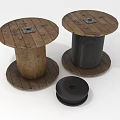 Two Wooden Cable Spools With Black Wire And Circular Cap Design