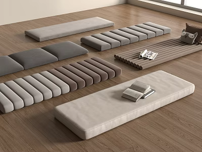 Various Rectangular Fabric Floor Cushions In Different Colors On Wooden Floor With Books 3d model