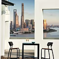 Black Bar Counter With Two High Chairs Wine Glasses And Green Bowl