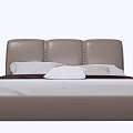 Modern Double Bed with Tufted Leather Headboard White Sheets and Decorative Pillows