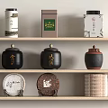 Traditional Tea Sets With Black Brown White Caddies And Tea Cakes On Shelves