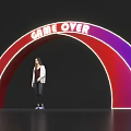 Vibrant Red Purple Archway Featuring GAME OVER Text With Person Standing Underneath