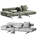 Modern Upholstered Two Seater Sofa With Green Beige Tones Plush Pillows And Soft Blanket