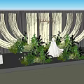 Elegant Wooden Sculpted Wedding Scene With White Dress Green Plants And Flowers