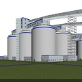 Industrial Plant Exterior View With Large Silos Blue Accents Green Lawn And Metal Structures