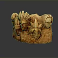 Wooden Sculpture Carving with Multiple Human Faces and Intricate Wood Grain Details