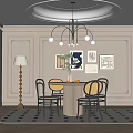 Elegant Dining Room Interior Design With Round Table Black Chairs Circular Chandelier And Wall Art