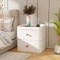 Modern White Bedside Table With Drawers And Vase Cup In Bedroom Interior