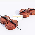 Two Elegant Wooden Violins As Musical Instruments Placed On White Background