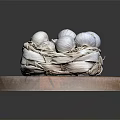 Fresh Garlic Bulbs in Wicker Basket on Wooden Cutting Board Against Black Background