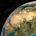 View of Earth from Space with Starry Background and Blue Oceans