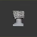 Plant Growing In Intricate Carved Stone Planter With Detailed Base Design