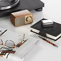 Vintage Audio Equipment Setup With Turntable Radio Open Newspaper Eyeglasses Notebook And Pen