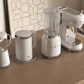 White Kitchen Appliances Including Kettle Blender And Coffee Maker On Wooden Countertop