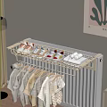 Wall Mounted Clothes Rack With Children's Clothes Shoes Slippers And Light Colored Wall