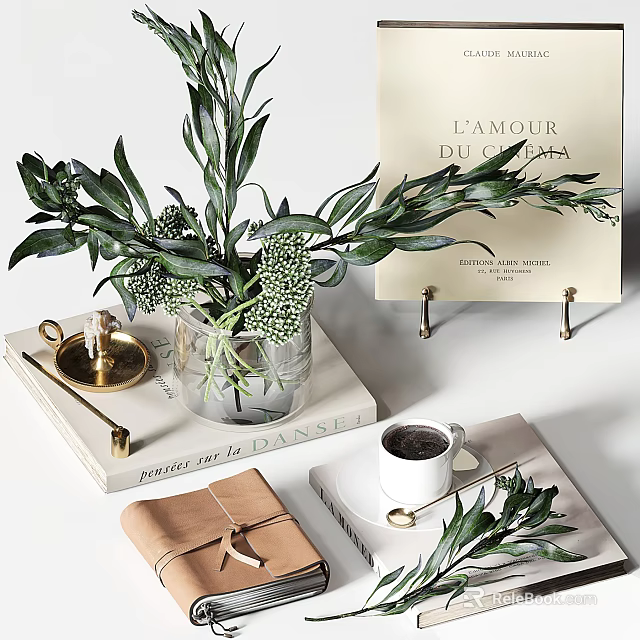 Stylish Decorative Ornament Set With Green Foliage Clear Glass Vase Books Candle And Coffee Cup 3d model 