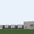 Modern Industrial Factory Building With Steel Structure Cooling Towers Green Lawn And Parking Space