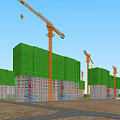 Large Construction Site With Multiple Cranes And Green Residential Buildings in Urban Area