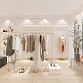 Modern Fashion Clothing Store Interior With Hanging Apparel Mannequins Green Plants And Lighting