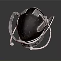 Black Gemstone Sculpture With Silver Metal Ring Stand And Reflective Base