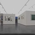 Modern Minimalist Gallery Interior With Paintings On Walls Shelving And Dark Flooring