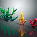 Colorful Coral Polyps In Three Colors Green Yellow Red On Gray Background With Reflection