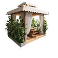 Cozy Outdoor Gazebo Structure With White Curtains And Wooden Furniture Surrounded By Green Plants