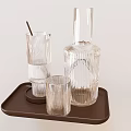Transparent Textured Glass Wine Bottle And Wine Glasses On Brown Tray