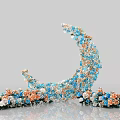 Beautiful Crescent Moon Decorative Arrangement With Blue Orange Flowers Crystal Accents And Scattered Blooms